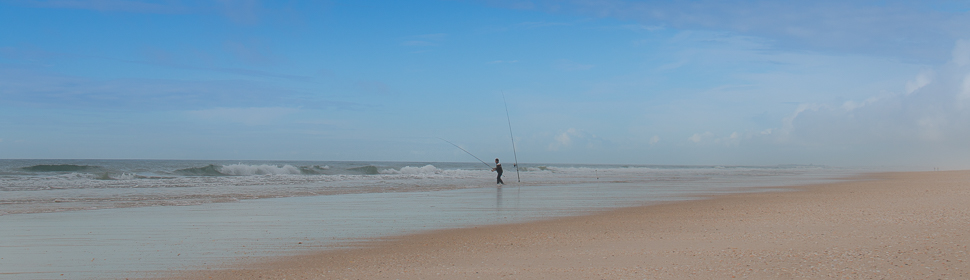 Angler am Meer